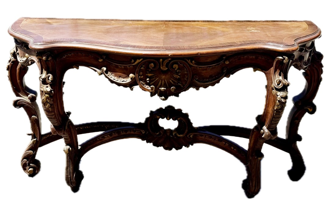 19thC. French Rococo Style Carved Wood Console Table: Heavily carved and inlaid wood console table. Distinctive violin-shaped top. Banded inlay; 32in.H. x 52in.W. x 19in.D.