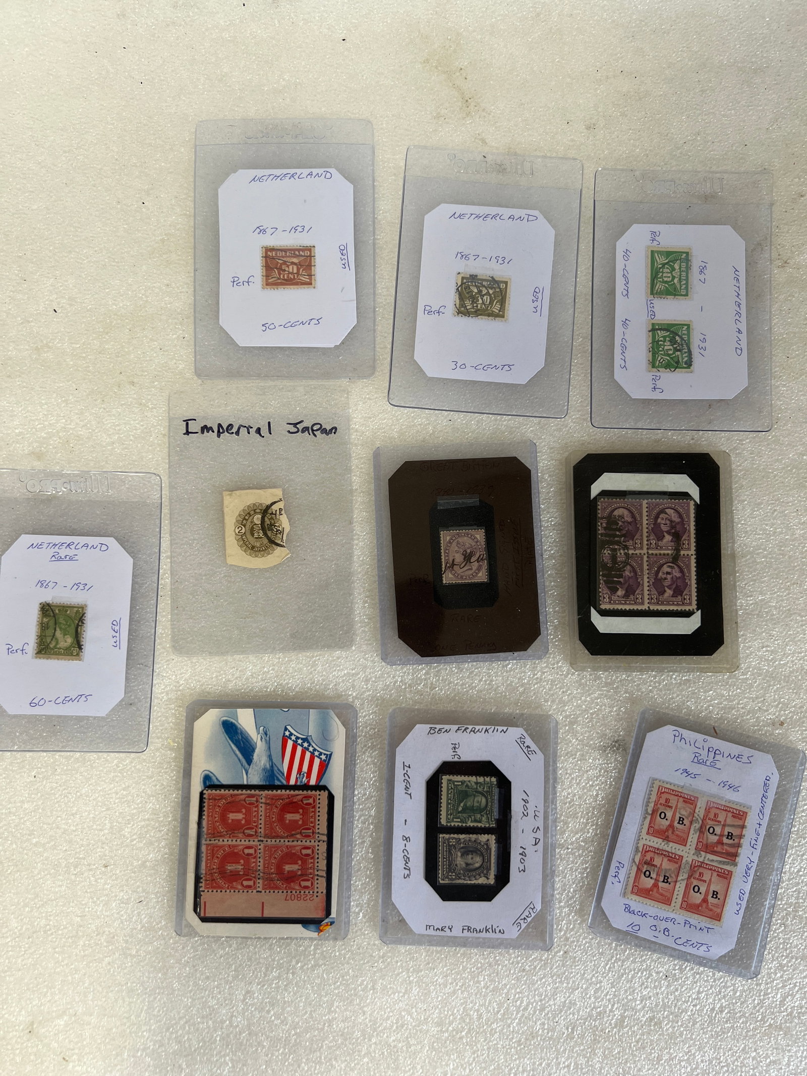 Vintage Lot of Stamps (10): All in protective case. As pictured