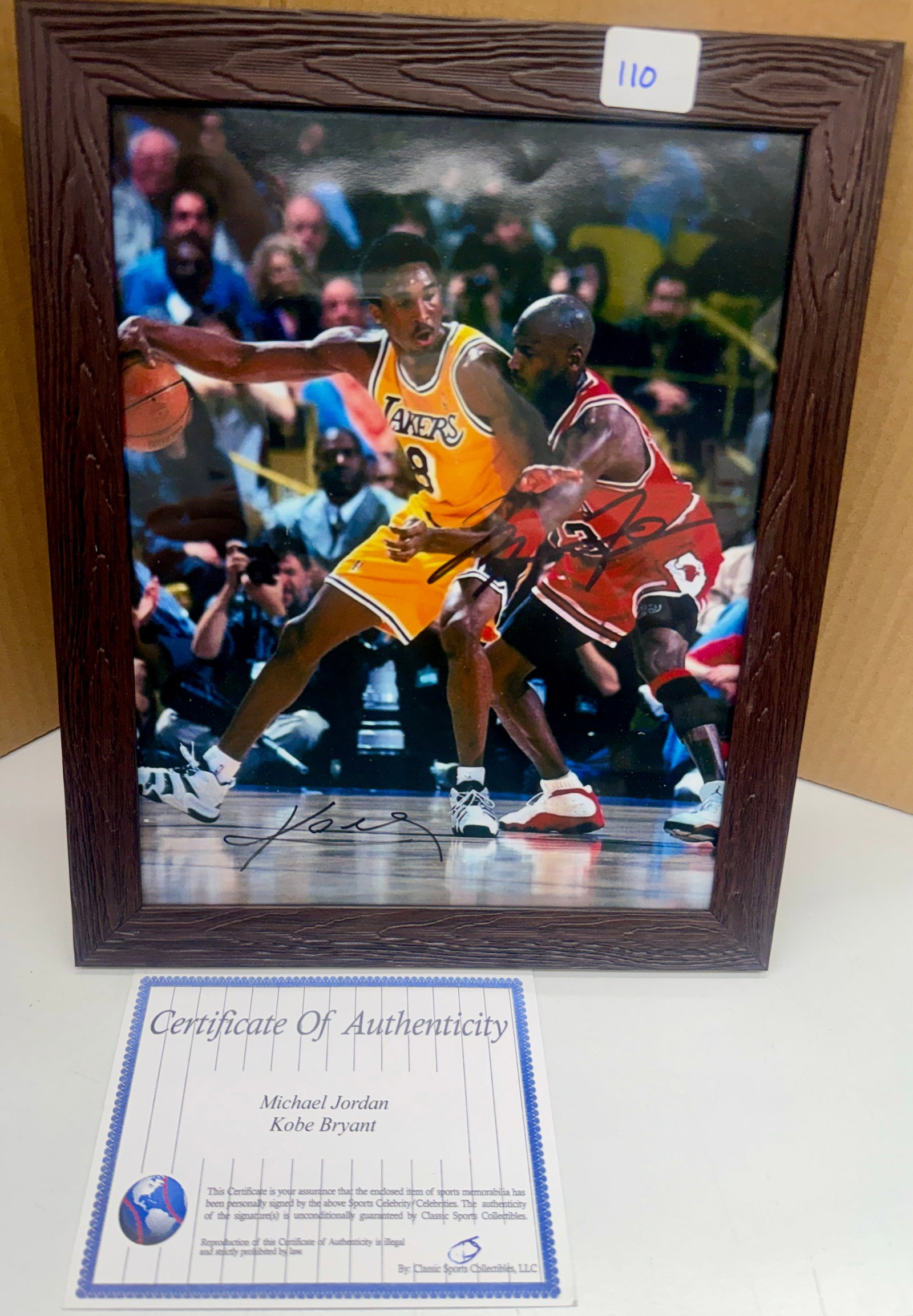 Jordan/Bryant Signed Photograph with COA: Michael Jordan and Kobe Bryant. 8x10. With certificate of liability. Framed.