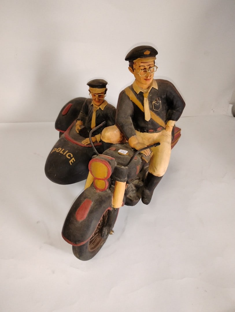 Unusual Figural Motorcyle Figure: Probably resin. As pictured 16 1/2" H X 19"W