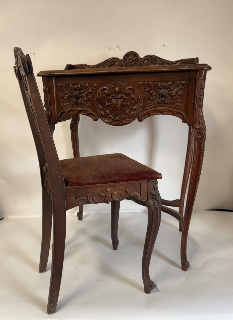 Victorian MahoganyTelephone Table and Chair: Carved mahogany telephone table and chair. Upholstered seat; 33in.H. x 24in.W. x 14in.D.(table), 32in.H. x 13in.W. x 14in.D.(chair)