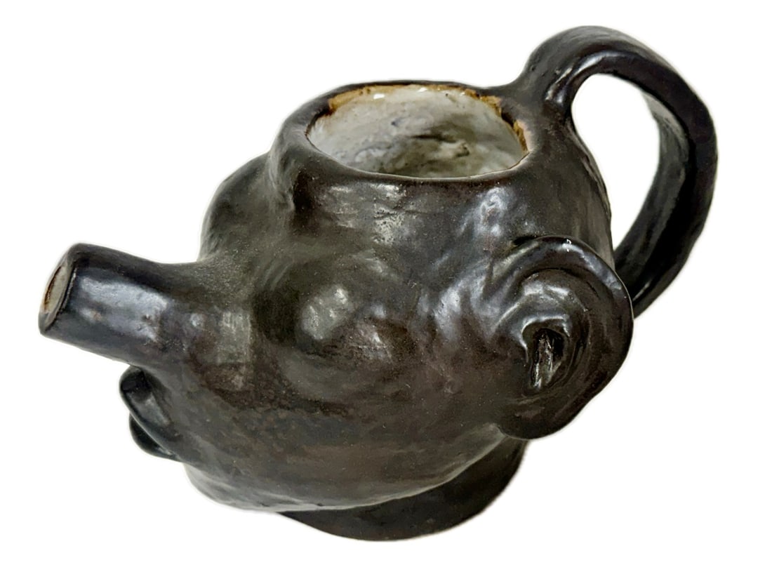 Folk Art Whimsical Pottery Teapot: Glazed pottery teapot. Head of a man. Artist signed; 7in. x 6in. x 11in.(firing break in handle)