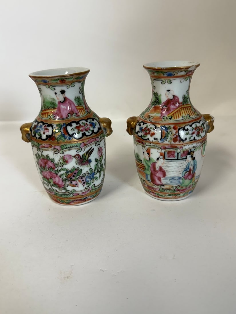 Two(2) Antique Chinese Rose Medallion Porceain Vases: Two(2) antique hand painted Rose Medallion porcelain cabinet vases. One(1) as is with chip; 4.5in.H.