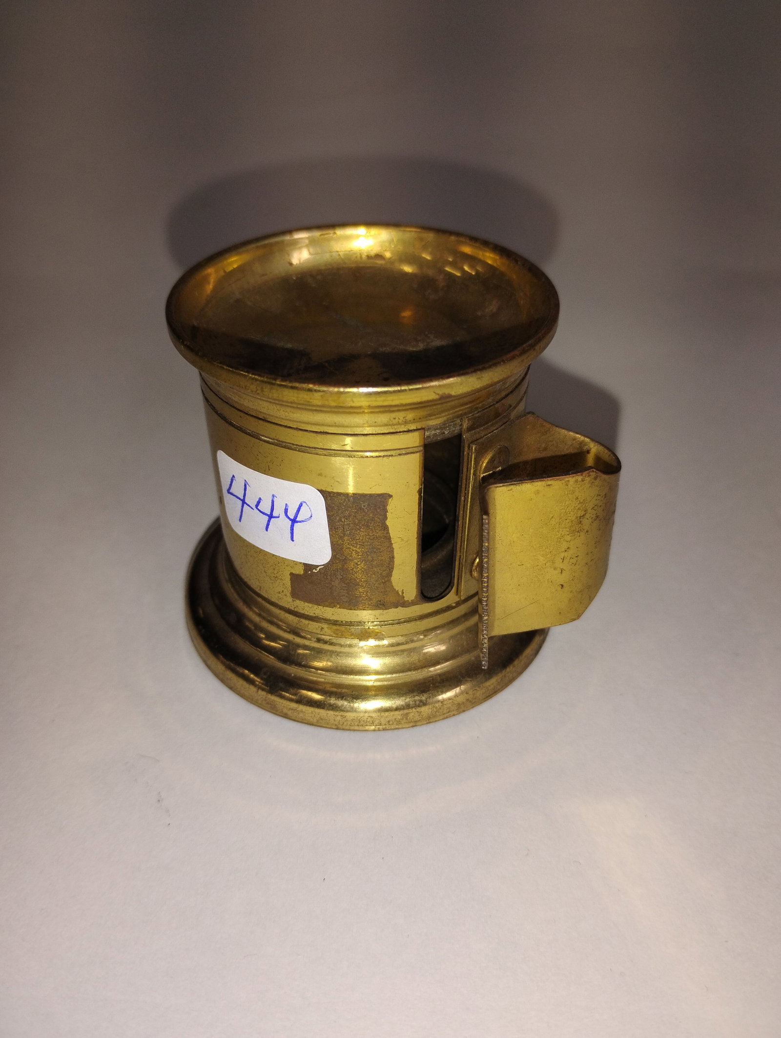 Antique Brass Desk Top Roll of Stamps Holder: As pictured. Heavy weight for desk top usage as paperweight 2 1/8:H and 2 5/8" W