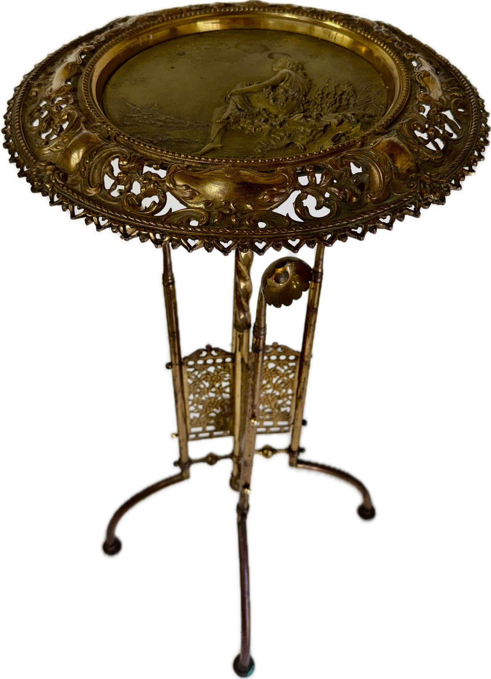 Fancy Victorian Art Nouveau Brass Plant Stand: Fancy Art Nouveau open work brass plant stand. Having a reticulated and bas relief top depicting a young girl in a landscape setting; 32in.H. X 15.5in.D.(top)