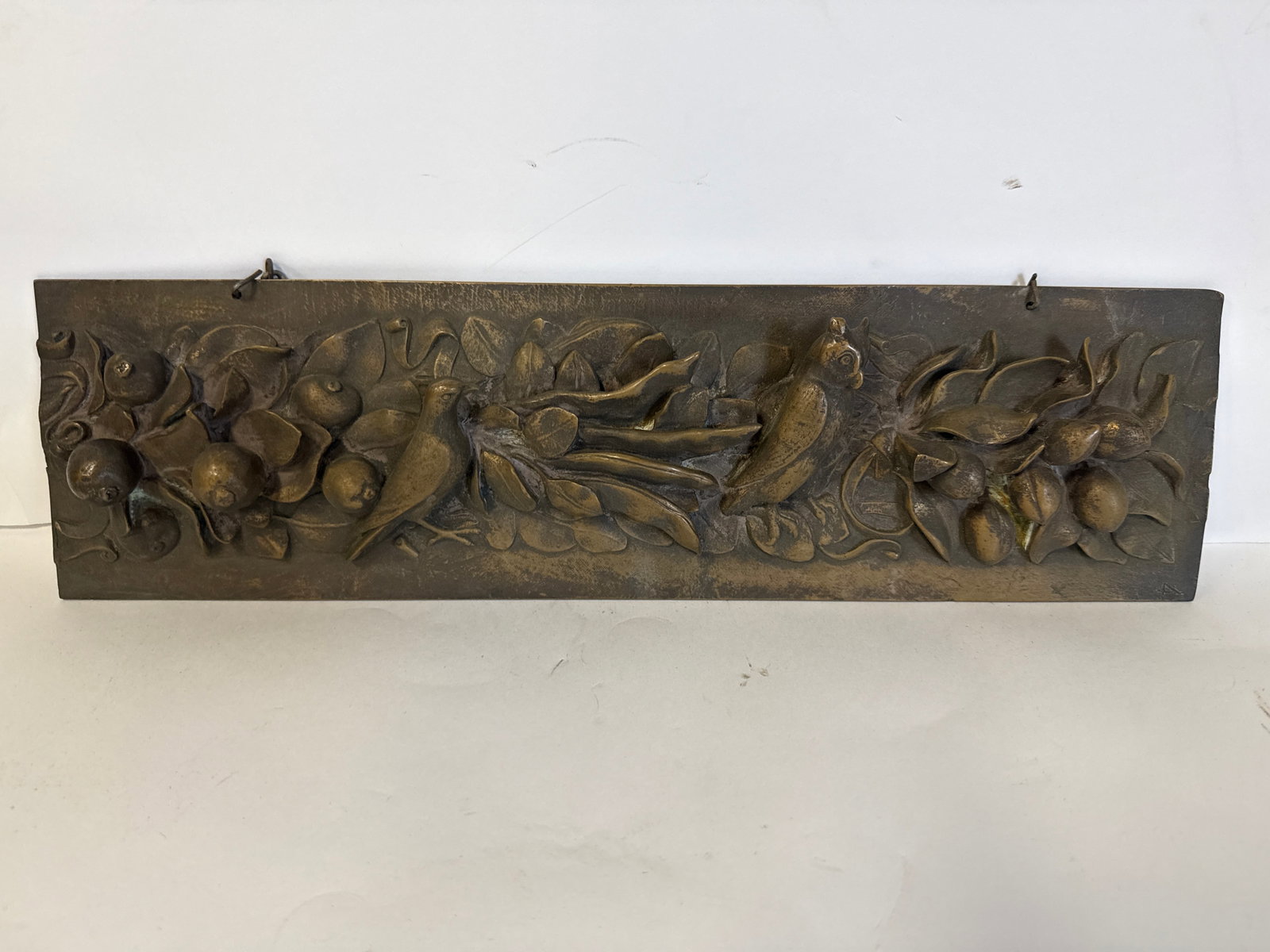 19thC. Continental High Relief Bronze Plaque: Well detailed bronze plaque with bird and owl amongst fruit in high relief; 5.25inH. X 17.75inW.