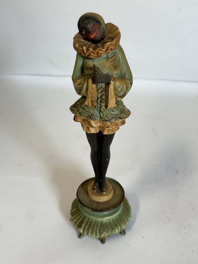 Art Deco Cold Painted Metal Figure of a Black Harlequin: Cold painted metal figure; 9.25in.H. x 2.75in.W.