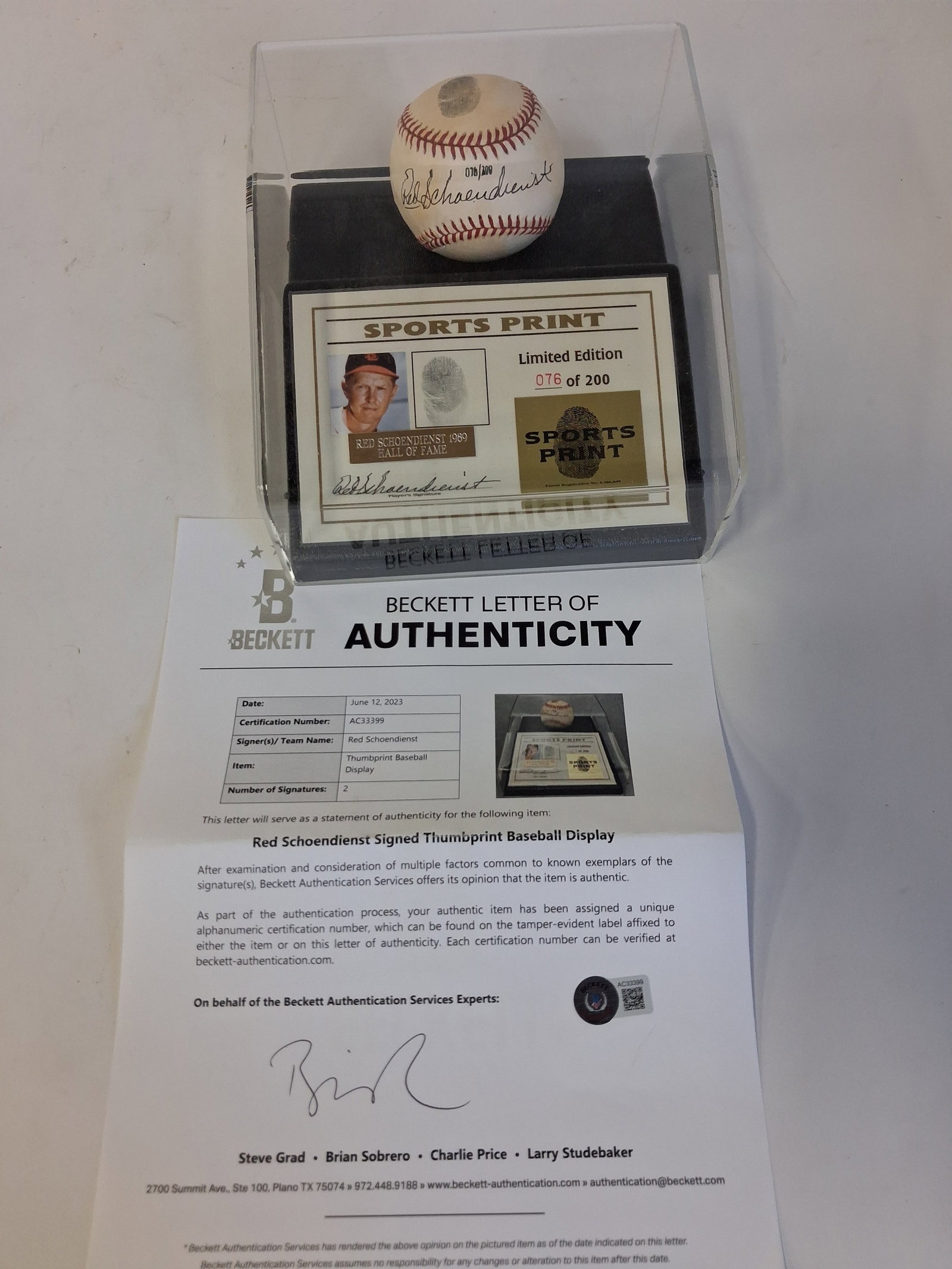 Red Schoendienst Sgd. Thumprint Baseball Display: With Beckett Letter of Authenticity In a customized display case.