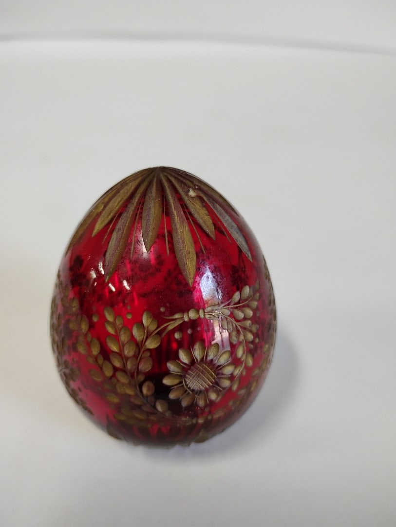 Russian Glass Egg with Markings: Cranberry glass with Russian label at the underside. 2 1/2"H