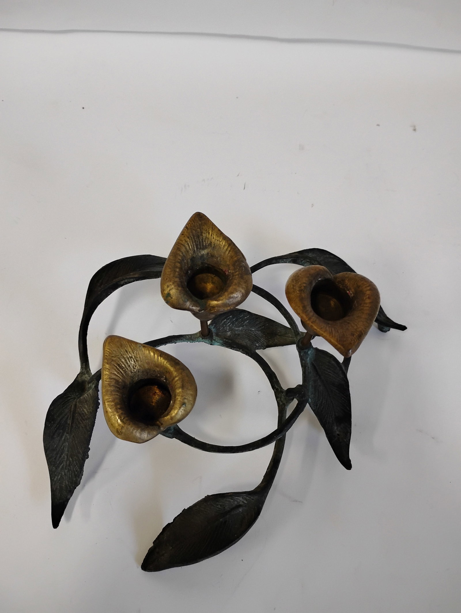 Bronze and Iron Lily Candleholder: As pictured. 4 1/2" H 9 1/2"W
