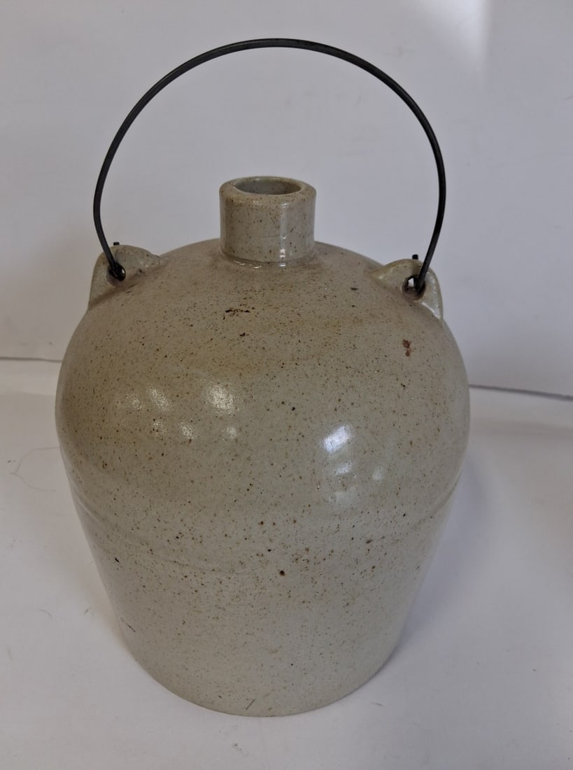 Stoneware Handled Jug: 9in H x6 1/2in base