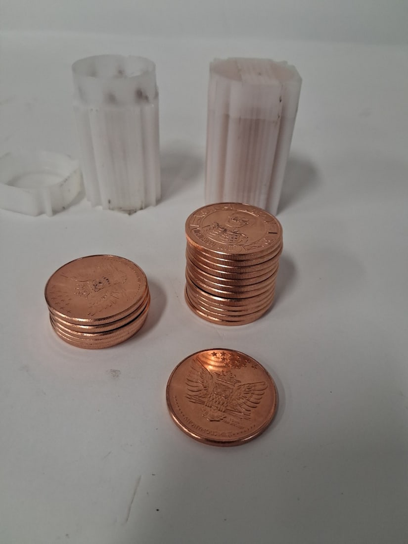 Day of the Dead copper rounds: 40 one oz copper rounds within 2 tubes. one unopened