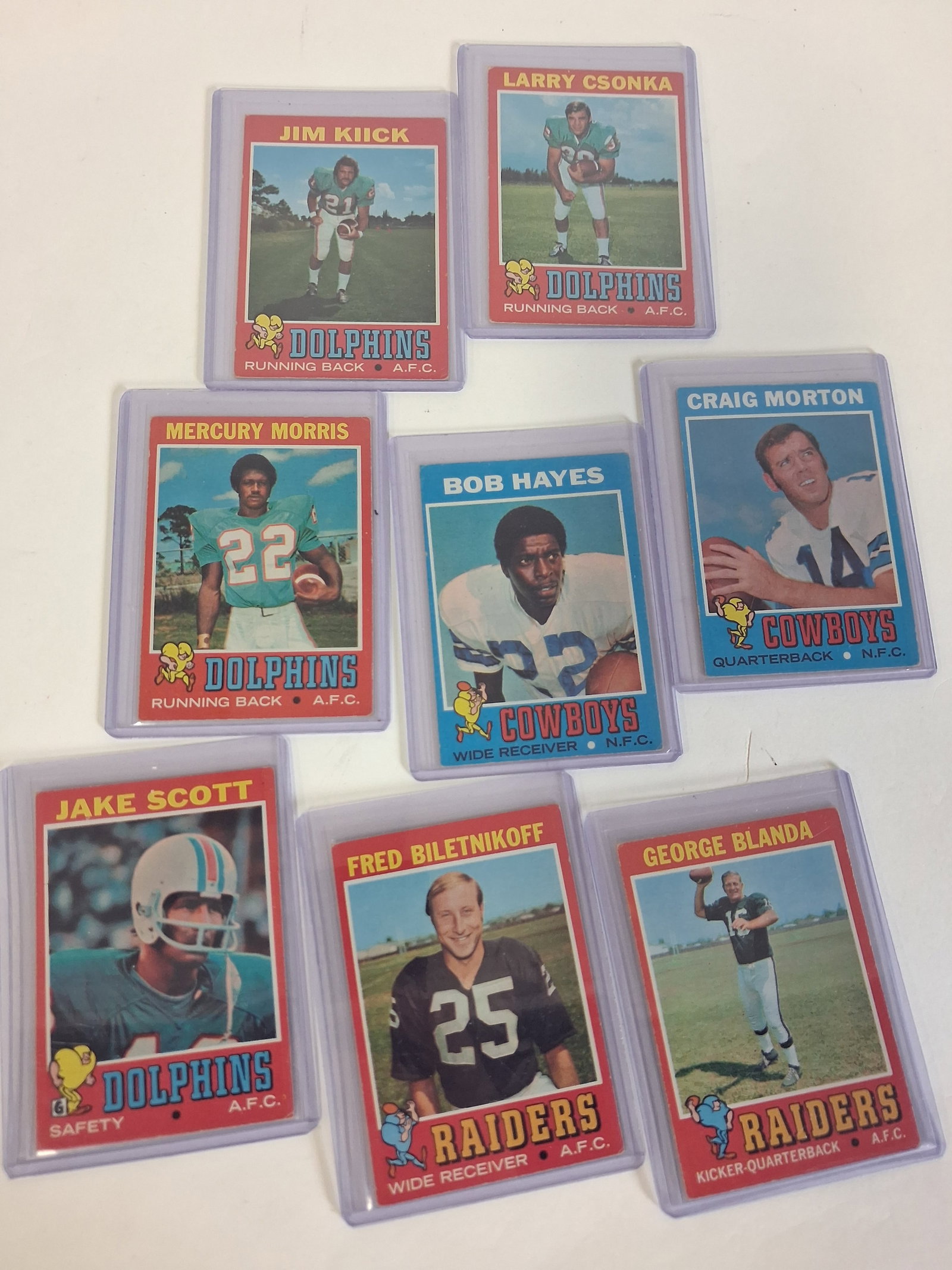 1971 Topps Football Cards: Lot of 8 cards. All in Protective Case. Raiders (2), Cowboys (2), Dolphins (4). As Pictured