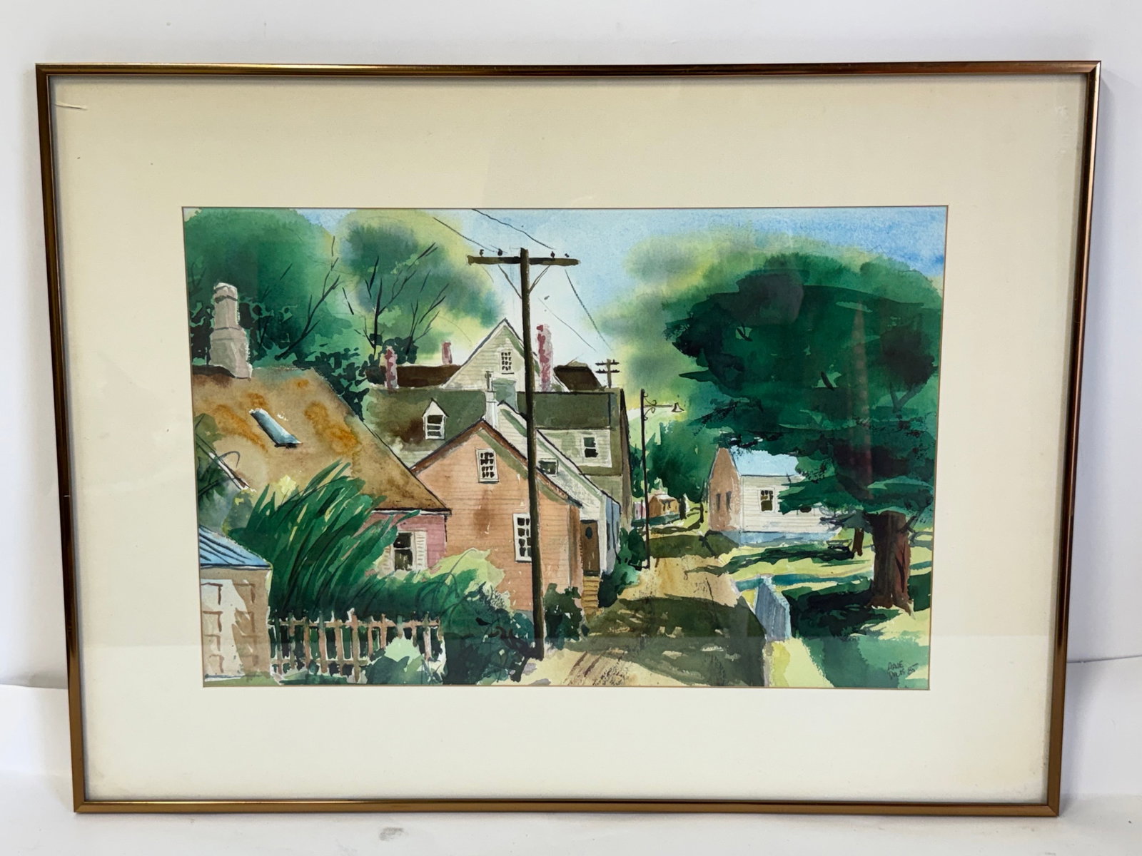 Arnie Davis; 20thC. American Watercolor Street Scene Signed: Watercolor on paper. A Rural Street. Signed lower right and dated '85; 13in. x 20in.(image), 20in. x 27in.(framed)