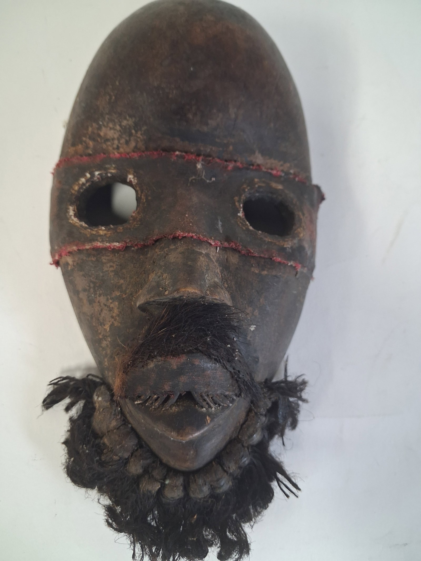 Antique Craved African Mask: 10in x 5in wHand craved Wooden Mask. As pictured.