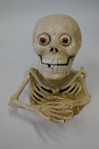 Cast Iron Mechanical Skeleton Bank: 7"H.