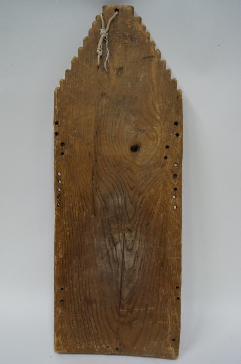 American Indian cradle board: Hand made wooden cradle board. Pueblo design; 28in. H. x 10in. W.