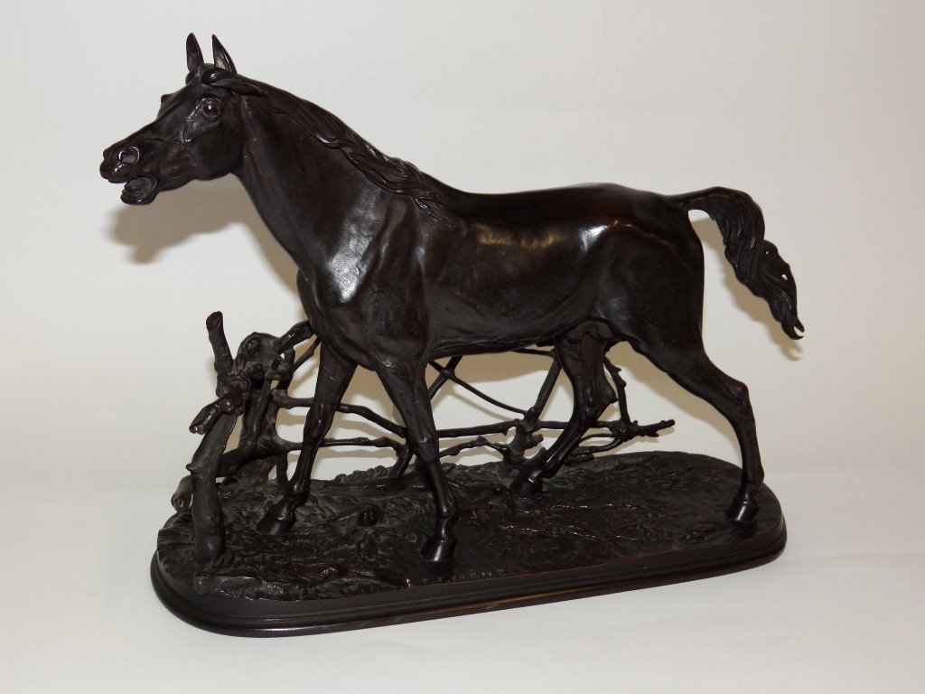 Pierre Jules Mene; Bronze Horse Signed: Bronze Sculpture of a Barbary Stallion Signed P. J. Mene. The lot is accompanied by a book Bronze Sculptures of 'Les Animaliers" Reference and Price Guide in which the bronze is illustrated. Also acco