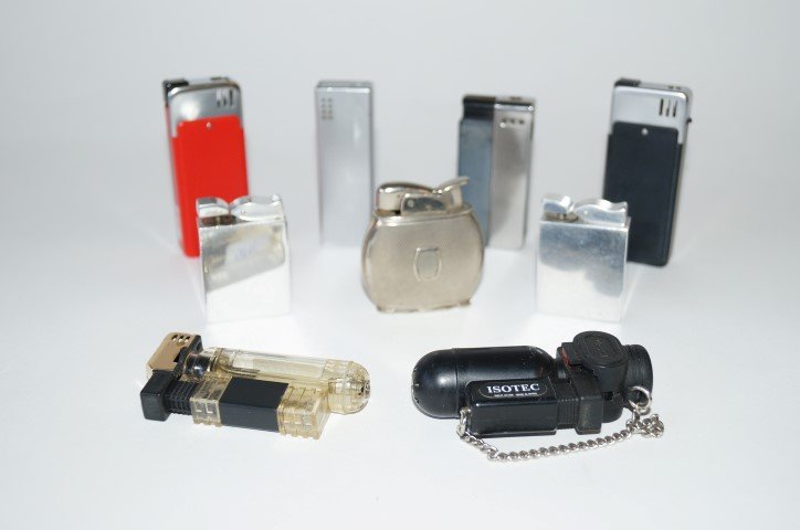 Collectible Lighters (9): Included in the lot is an Evans Art Deco; Isotec; Tank Guy; Evelyn Upton modernist design (2); W. German and three others. Nine in the lot