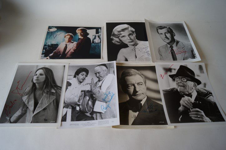 Sgd. Movie Stills inc. Streisand (7): Barbara Streisand, sgd. in red ink; Sylvester Stallone and Burgess Meredith sgd. in blue ink on an original Rocky movie still; George Burns; Stewart Granger; Claude Rains sgd. in ink on a Warner Bros.
