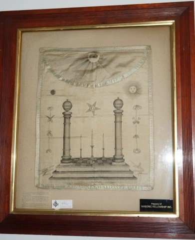 Rev. John Brown's Masonic Apron: Initiated in 1817. Died 1884. Apron was a gift of the Reverend's grandson. Framed 28 3/4" x 25 3/4"