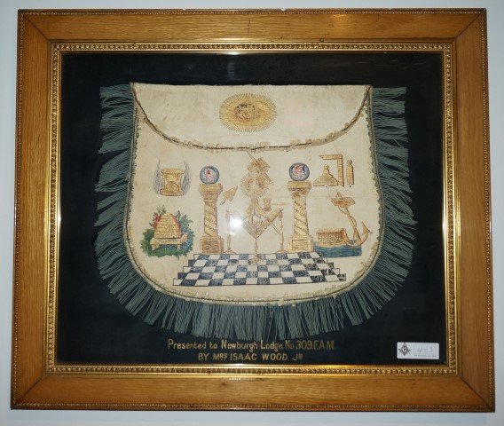 Elaborate Masonic Apron: Elaborately paint decorated leather apron, fringed. Presented to Newburgh Lodge No. 309 by Mrs. Isaac Wood, Jr. Framed 25 1/2"H. x 30 1/4"W.