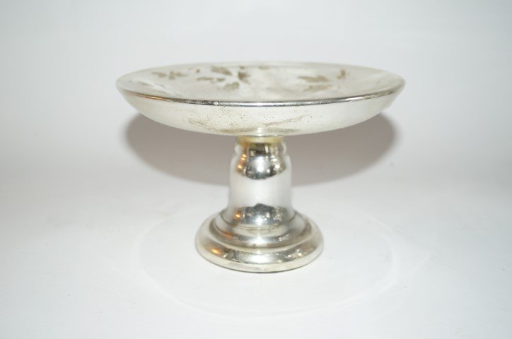 Mercury Glass Compote: Mercury glass pedestaled compote. Traces of frosted leaf design; 4.75in. H. x 7.5in. D.