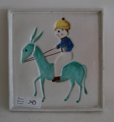 Italian Pottery Tile: Boy riding a donkey. Marked Deruta, Italy. 9 1/4"w x 10 1/2"w