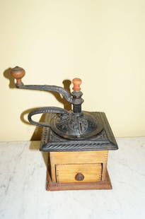 Antique Oak and Wrought Iron Pepper Grinder: One drawer dovetailed base with ornate wrought iron top . 11"H.