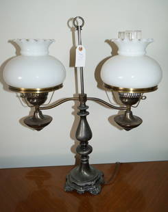 Double Armed Table Lamp: In the Victorian style, the double branches hold milk glass shades. 24"H. 20W.