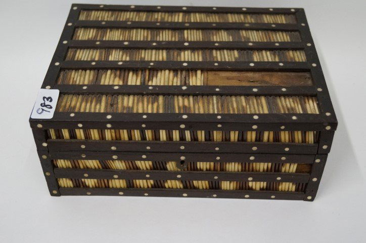 Porcupine Quill Box C 1850: Ivory and porcupie quills inliad in the hinged mahogany/ebony box. Ivory inlaid plaque inside the lid. Brass escutechen and hinges (one hinge as is) quills missing in a 4" section on the top lid. 11"L