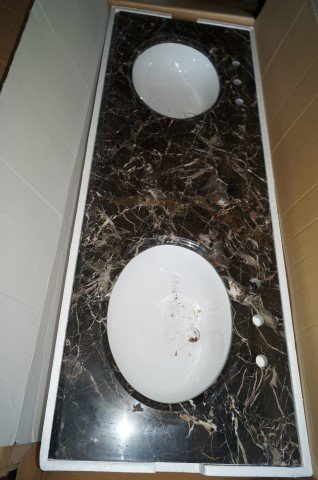 Marble Vanity Top: Natural marble double sink vanity. Doce Chocolata 61"W. x 22"D., 35.5in. OC, 19in. sink to sink