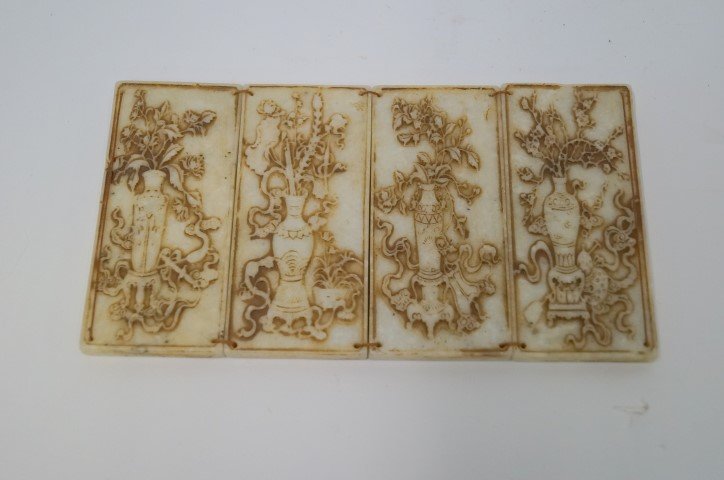 Chinese Four(4) Panel Jade Screen: Carved four(4) panel white jade diminutive table screen. Raised floral decoration; 4.25in. H. x 7.75in. W.