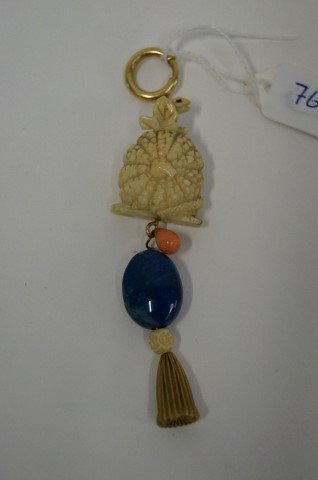 19th C. Ivory Netsuke: 19th C. ivory carving, a serpent arising from a leaf mounted gourd. Mounted on gold loop and toggle with coral, carved ivory bead and large lapis lazuli with "gold" tassel. 4"H.