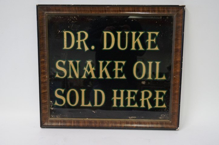 19th C. Western Advertising Sign: Reverse painted glass advertising sign. "Dr. Duke Snake Oil Sold Here". Frame; 18in. X 21in.