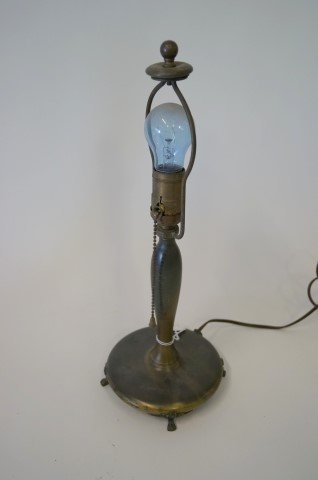 Pairpoint Lamp Base Signed: Bronzed footed lamp base. Signed Pairpoint with a P in a diamond mark. Numbered 00471/2 8 1/2 . Accomodates an 8" boudoir shade. Original finial, cap and bell shaped pull. 15 1/2"H. to finial
