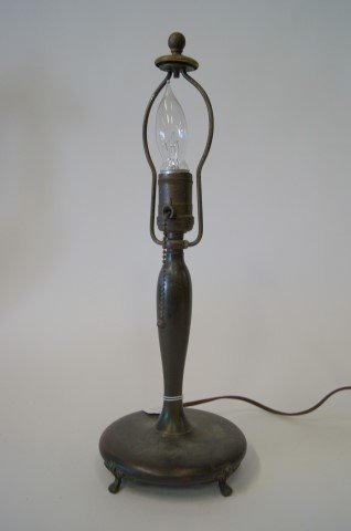 Pairpoint Lamp Base Signed: Bronzed footed lamp base. Signed Pairpoint with a P in a diamond mark. Numbered 5047 8 1/2 . Accomodates an 8" boudoir shade. Original finial, cap and ball shaped pull. Rare opportunity to have a pr. 
