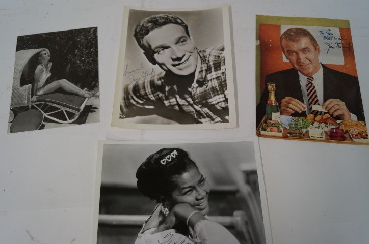 Autograph Lot: Ella Fitzgerald ink signed photo; Cesar Romero sgd. photo; Rosalind Russell sgd. photo; photograph of Pearl Bailey autographed in ink "To Gene, Love Pearl; Jimmy Steward signature on an early Air Fran