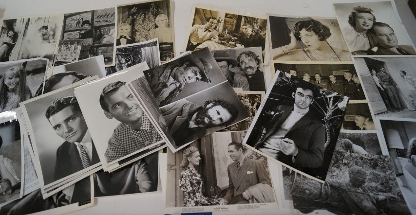 Vintage Movie Stills 1920's-1960's (51): A 1928 Gary Cooper photograph (as is-paper affixed to front, probably issued in 1971); Yul Brynner in a scene from The Ten Commandments R66; Fannie Brice, 1928-1931 back stamps, cardboard stock with m