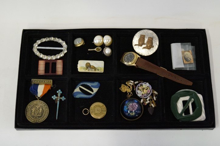 Dealer's Lot. Jewelry. Wrist Watch etc.: The lot includes buckles; earrings; cross necklace; misc. photo of Lincoln ; Movado wrist watch. Varying sizes.