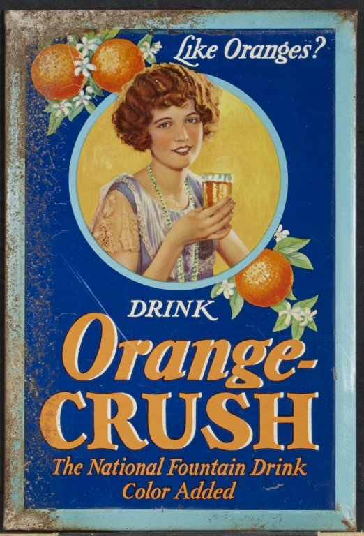 Orange Crush Advertisement: Lithography on tin. Condition: pitting to edges. ; 9 1/4" x 6 1/4"