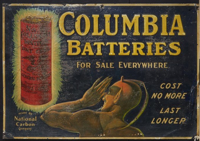 National Carbon Company Sign: Columbia Batteries. Lithography on tin. Condition: Discoloration.; 13 1/2" x 19 1/2"