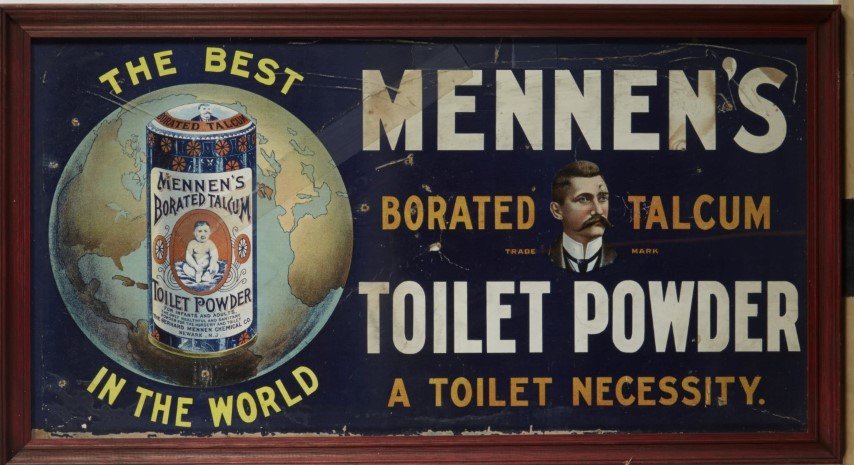 Mennen's Toilet Powder Sign: Lithography on cardboard. Framed. Some punctures. ; 12" x 22"