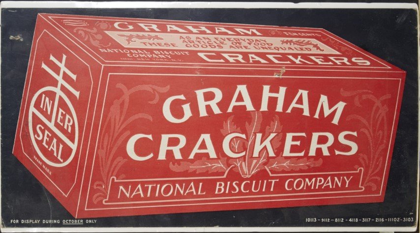 Graham Crackers Advertisement: National Biscuit Company. Lithography on cardboard. Puncture to upper left.; 11" x 21"