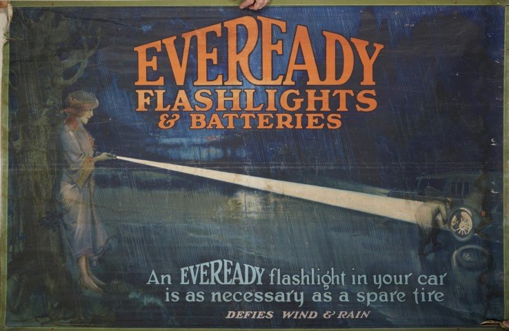 Eveready Flashlights & Batteries Sign: 1921.The T.F. Moore Co. Lithography on canvas. Condition: Ink Loss throughout image.; 39" x 60"