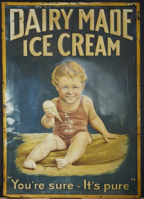 Dairy Made Ice Cream Sign: S.J. Wolff & Co. NY. Holes made for hanging. Embossed lithography on tin. Condition: Scratches ; 27 1/4" x 19 1/2"