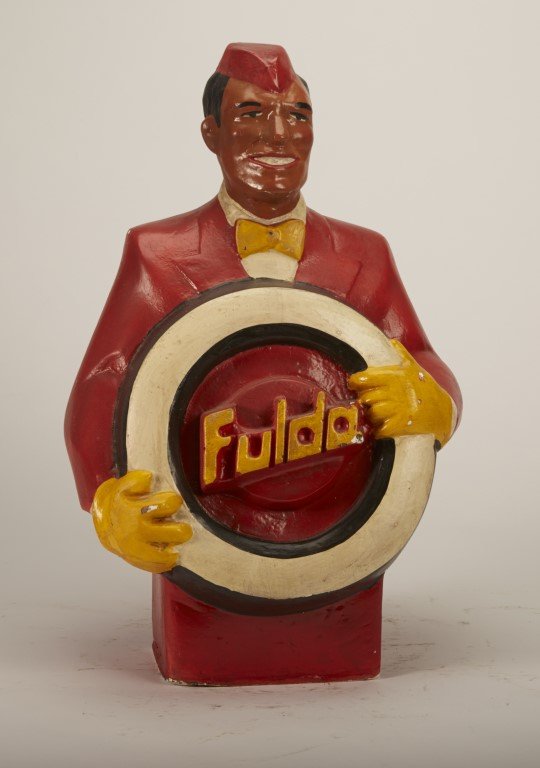 Fulda Tire Figural Display: Painted Plaster. Condition: Minor paint chipping.; 16" x 10"