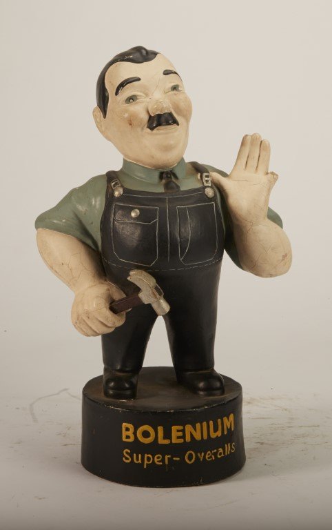 Bolenium Super-Overalls Statue: Handy man with hammer. Painted plaster. British. Missing finger.; 14" x 5"