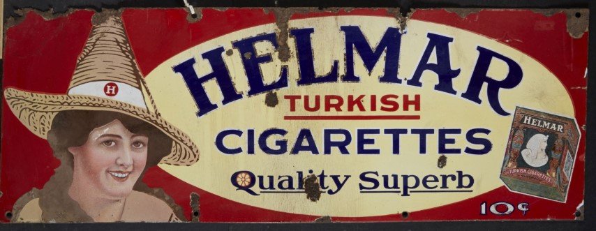 Helmar Turkish Cigarettes Advertisement: Enamel on Metal. Condition: Some loss to metal and enamel.; 10 x 27 1/2"