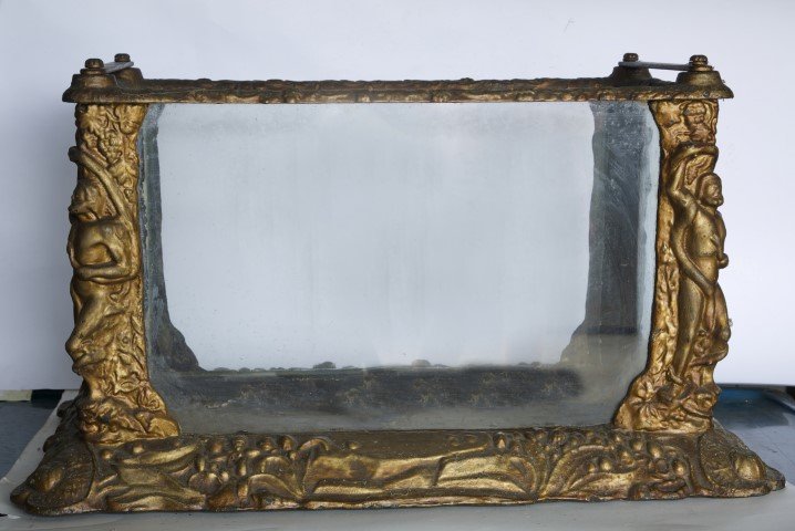 Turn of the Century Cast Iron Aquarium: Bas relief decorations of sea life with standing nautical figures at the corners. Glass panels.; 15" x 23" x 13"